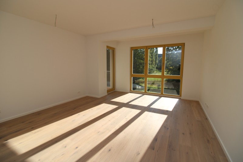 Erstbezug : Exklusiver Neubau im Zentrum mit Balkon, Fußbodenheizung und Parkett! - Photo 1