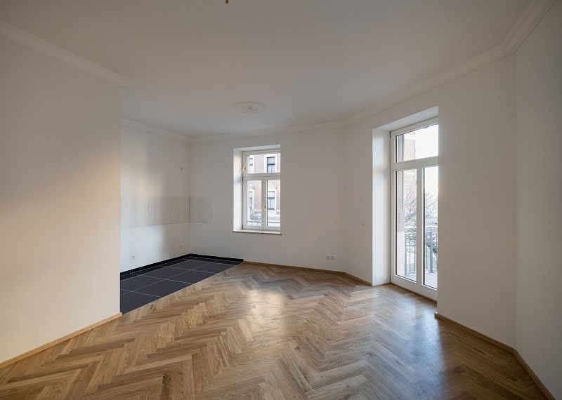 Sanierte 3-Zimmerwohnung mit Fußbodenheizung, Parkett, Balkon und Aufzug! - Photo 5