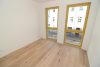 Erstbezug : Exklusiver Neubau im Zentrum mit Balkon, Fußbodenheizung und Parkett! - IMG_1090