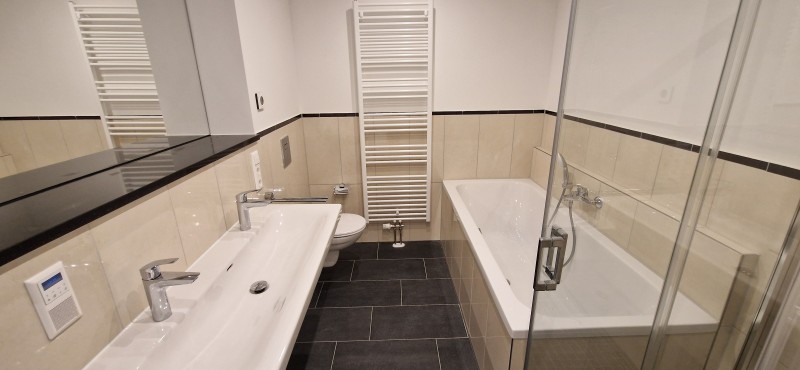 Traumhafte Wohnung im Neubau mit Fußbodenheizung, Parkett und Balkon! - Photo 4
