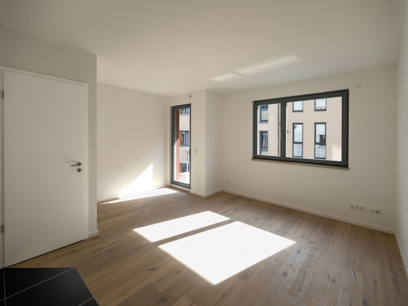 Traumhafte Wohnung im Neubau mit Fußbodenheizung, Parkett und Balkon! - Photo 1