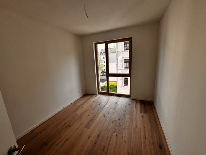 Exklusiver Neubau im Zentrum mit Balkon, Fußbodenheizung und Parkett! - Photo 2